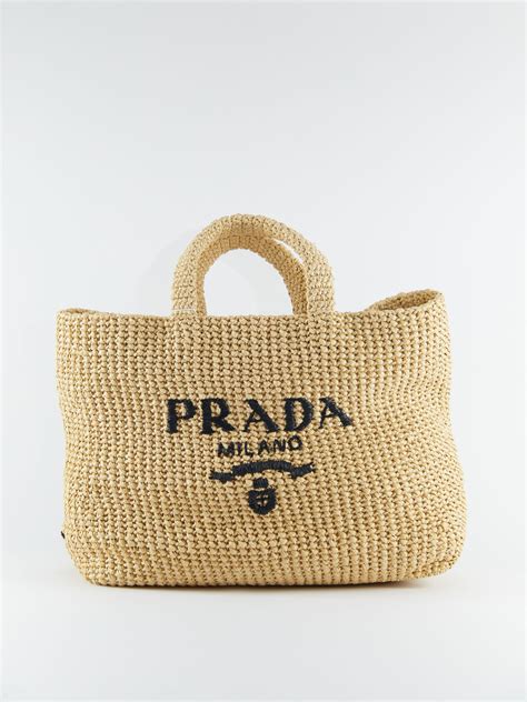 prada large raffia tote.